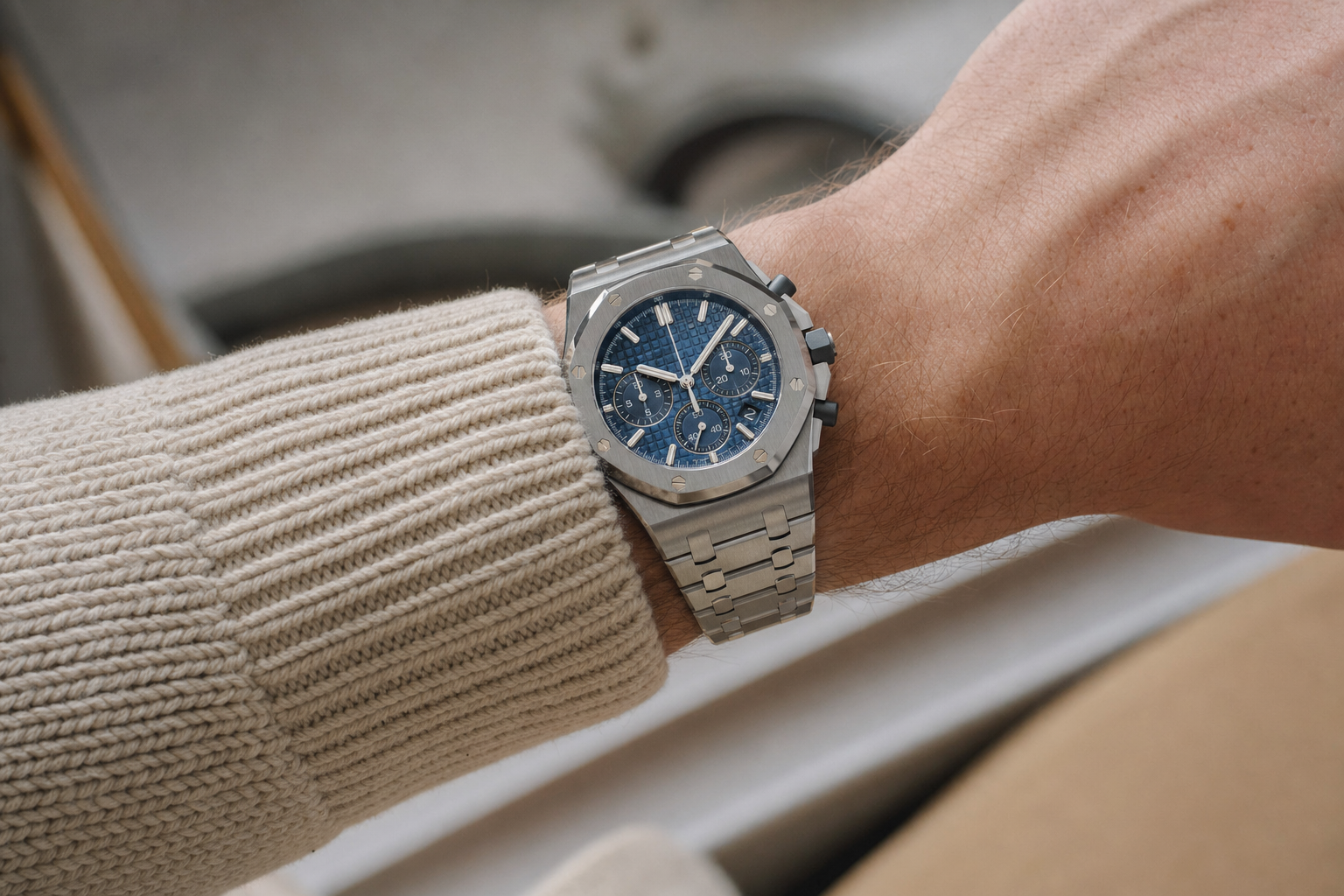 Audemars Piguet Royal Oak Offshore 42mm Chronograph in stainless steel with blue dial, showcasing its bold design and iconic features.
