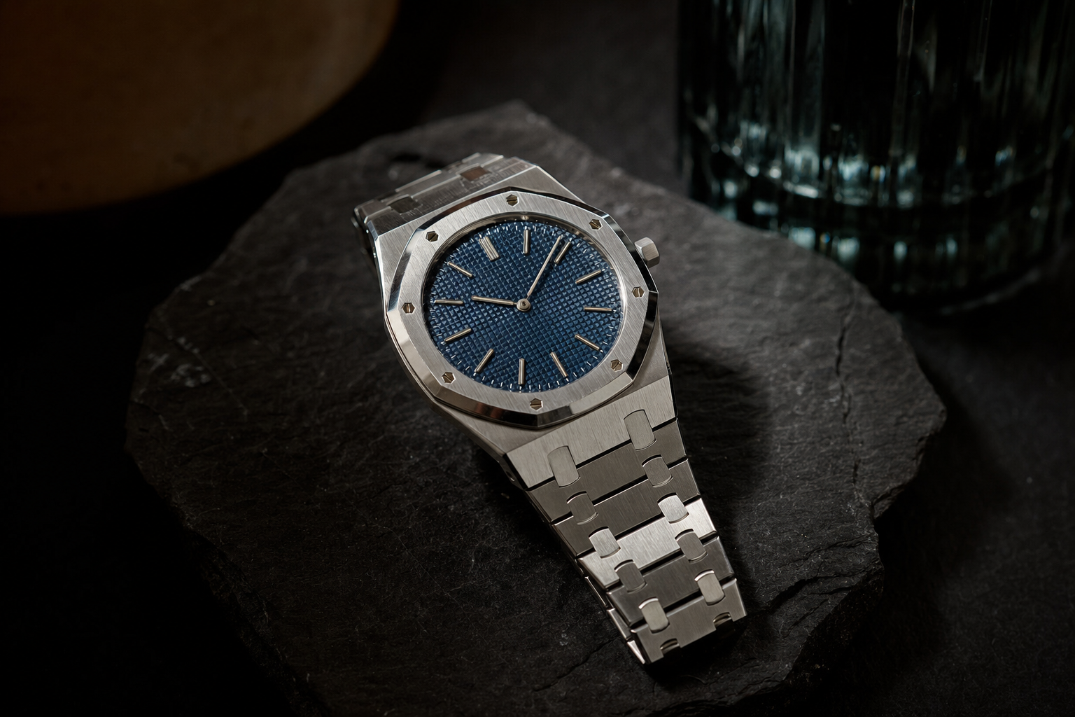 Iconic Audemars Piguet Royal Oak 15202ST 'Jumbo' Extra-Thin in stainless steel with a classic blue dial, showcasing the octagonal bezel and integrated bracelet, a true luxury watch investment.