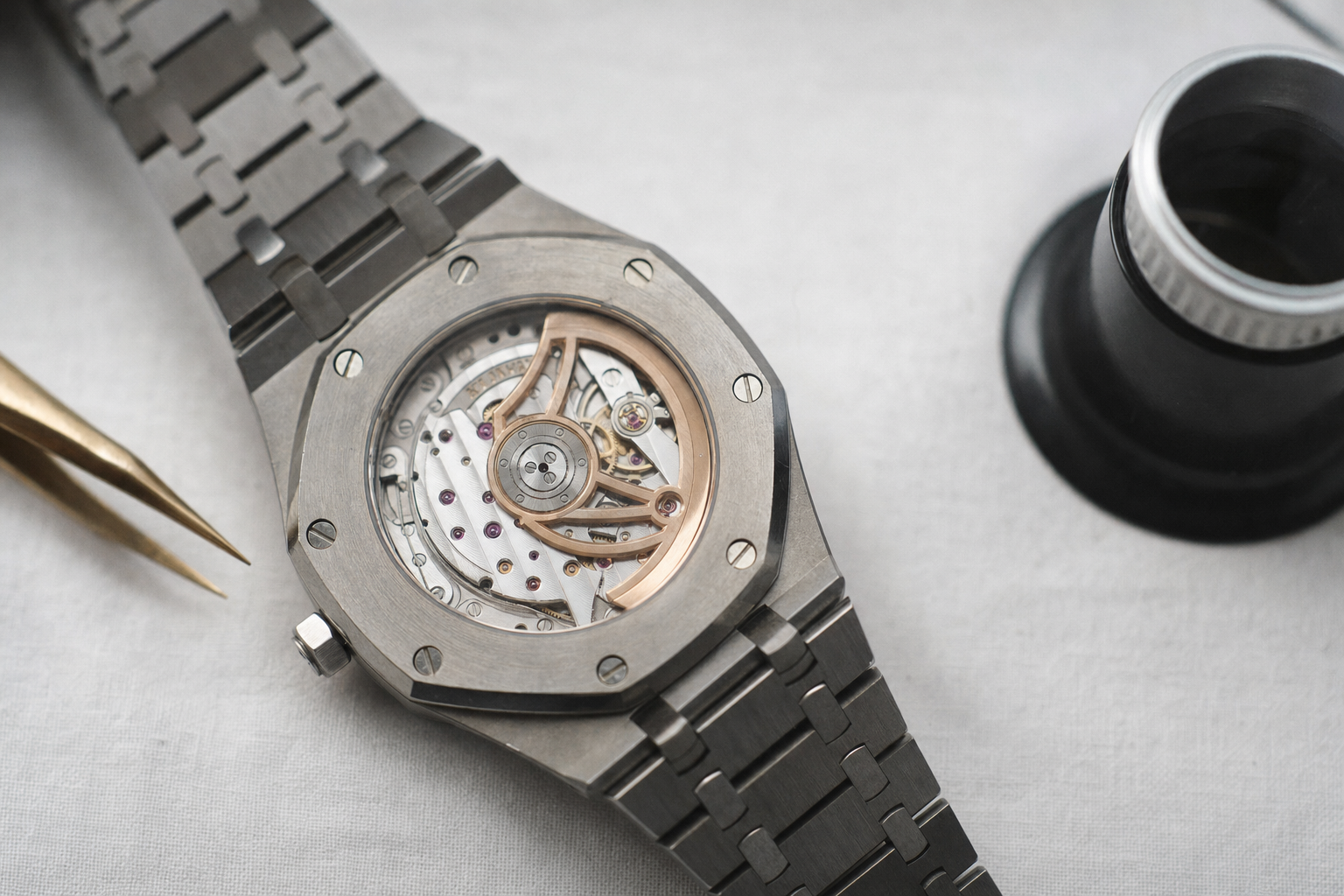Close-up of Audemars Piguet Royal Oak Caliber 7121 movement, revealing intricate finishing and skeletonized rotor.