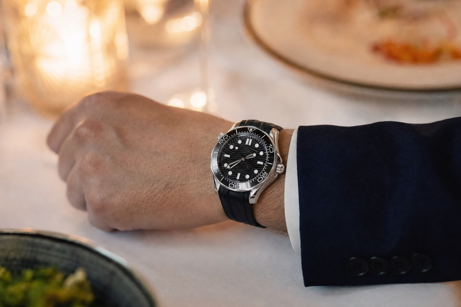 Stunning Omega Seamaster Diver 300M, a top luxury dive watch under $10,000, featuring a blue ceramic wave dial and Co-Axial Master Chronometer movement.