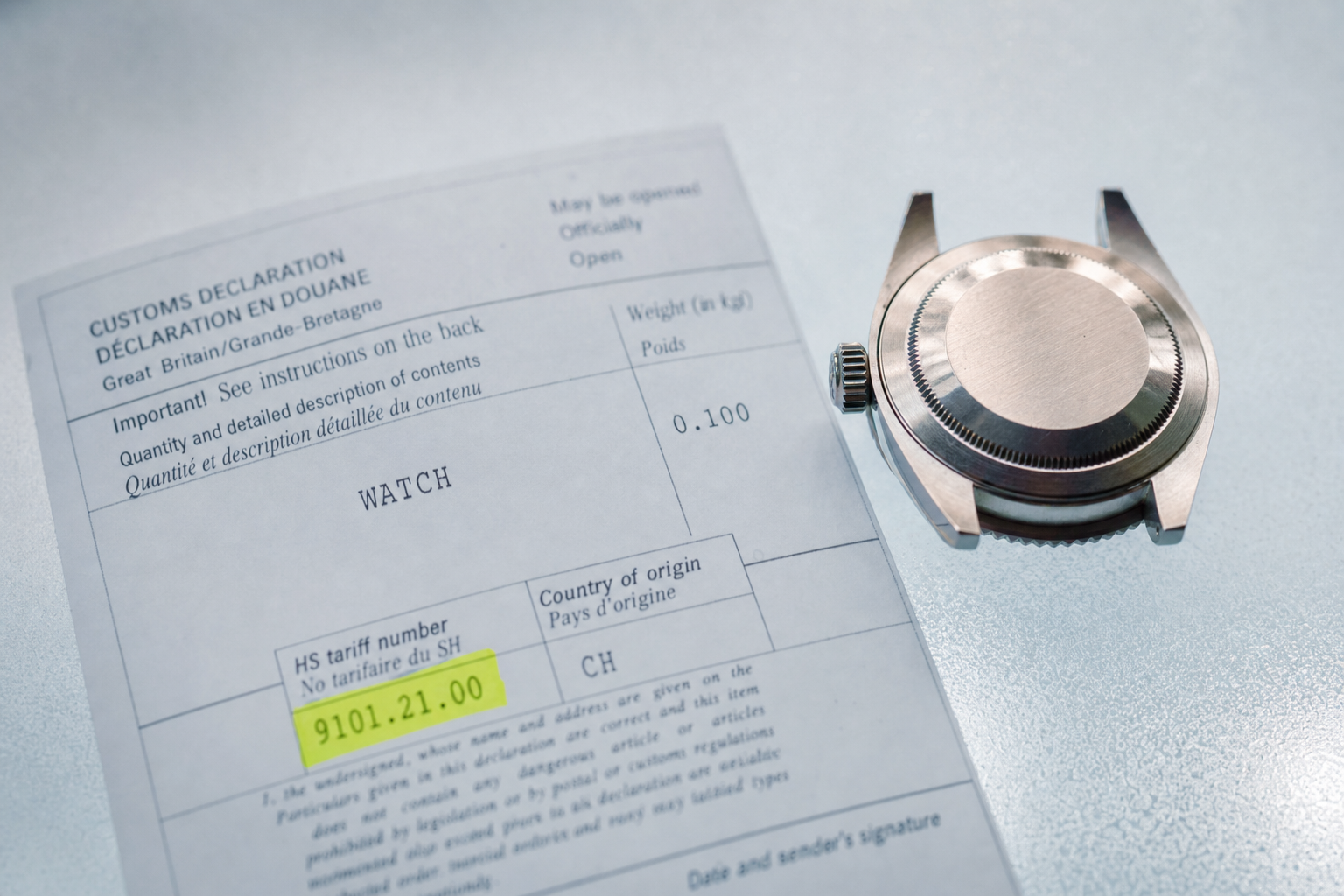 Customs declaration form showing HS codes and declared value for a luxury wristwatch import