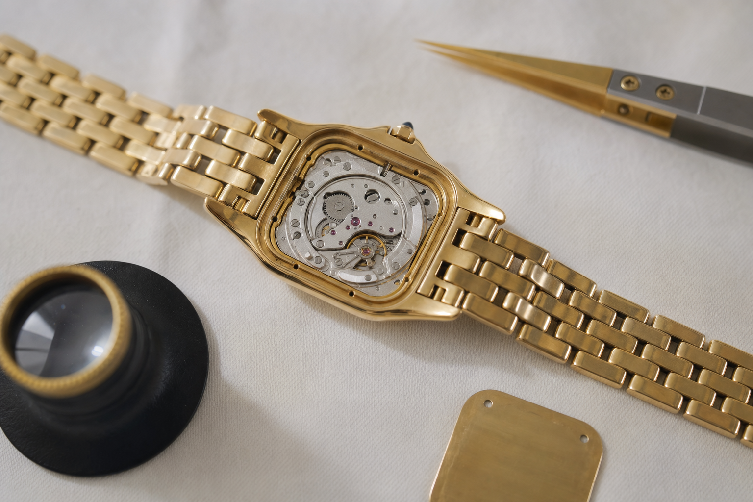 Luxurious Cartier Panthère de Cartier small yellow gold watch with diamond bezel, showcasing elegant women's timepiece