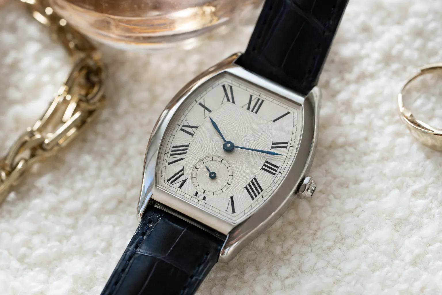 Vintage Cartier Tortue Monopoussoir in white gold showcasing its iconic curved Art Deco case