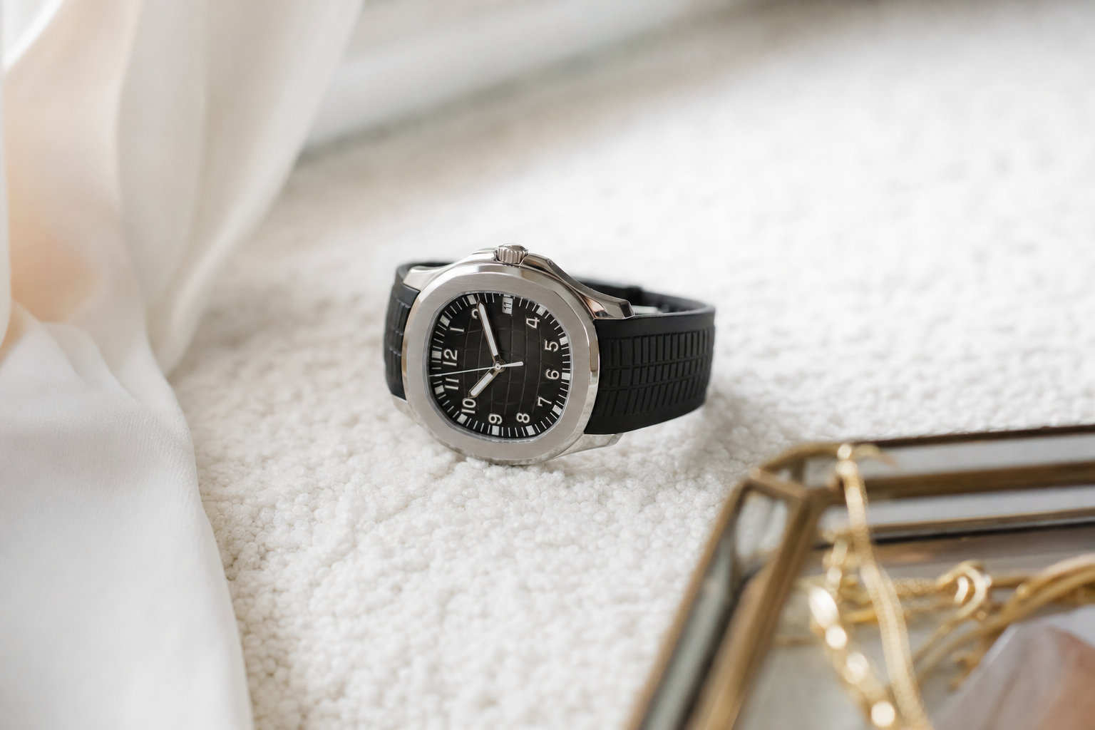 Sporty Patek Philippe Aquanaut Ref. 5167A with black dial and composite strap, ideal for daily wear