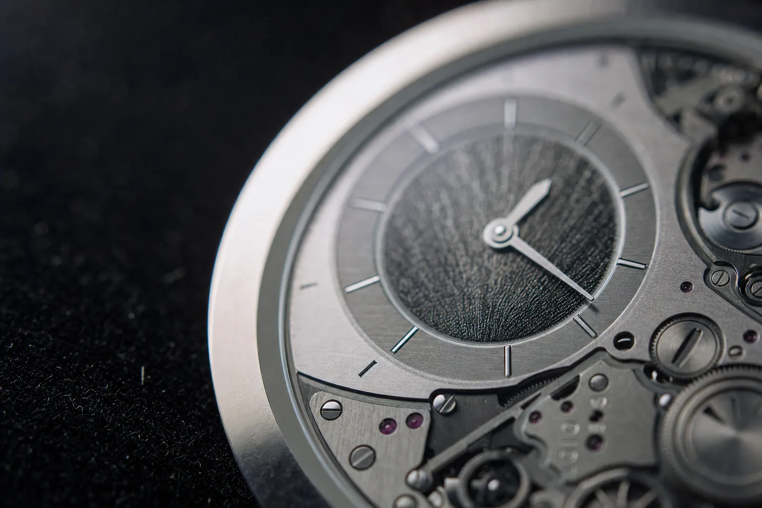 A close-up of the ultra-thin Piaget Altiplano Ultimate Concept watch, demonstrating its record-breaking 2mm thickness and intricate integrated movement.