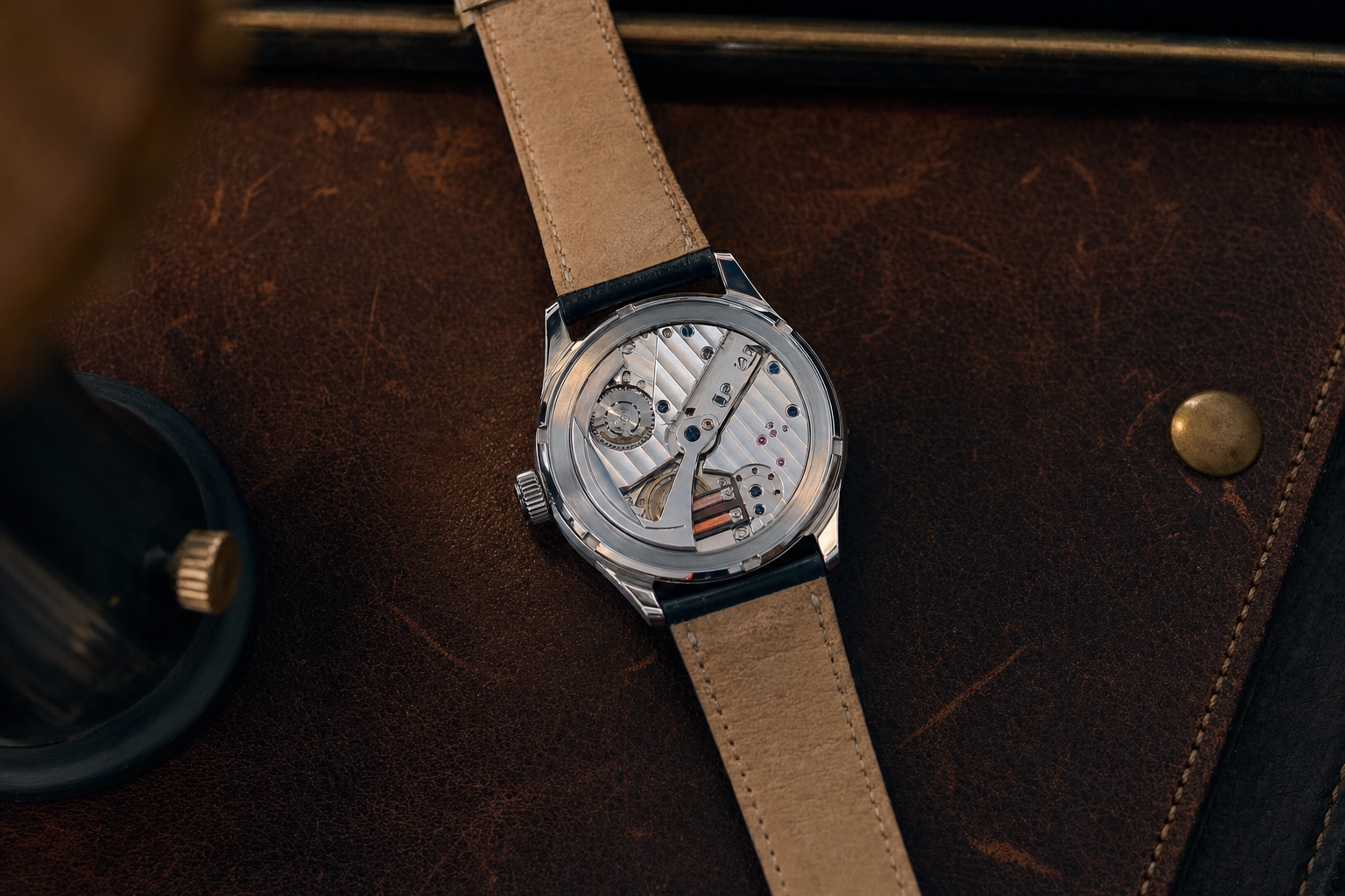 Detailed view of the Grand Seiko Spring Drive movement, highlighting the innovative Tri-synchro Regulator and the smooth-gliding seconds hand mechanism.
