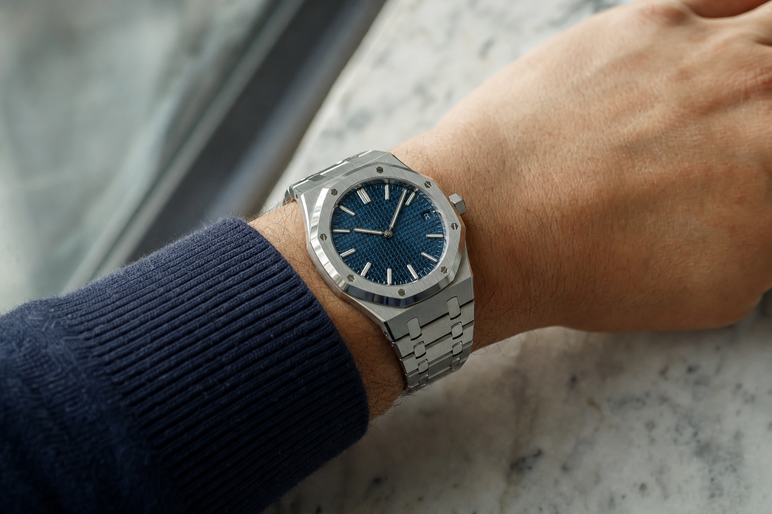 Pristine Audemars Piguet Royal Oak 15500ST on wrist, highlighting sharp case lines and integrated bracelet in stainless steel.