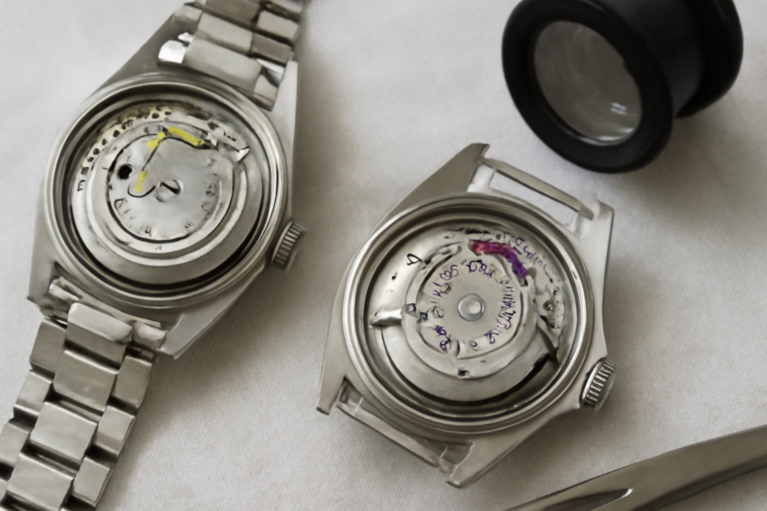 Side by side view of vintage Rolex GMT-Master 16750 acrylic and 16760 sapphire crystal