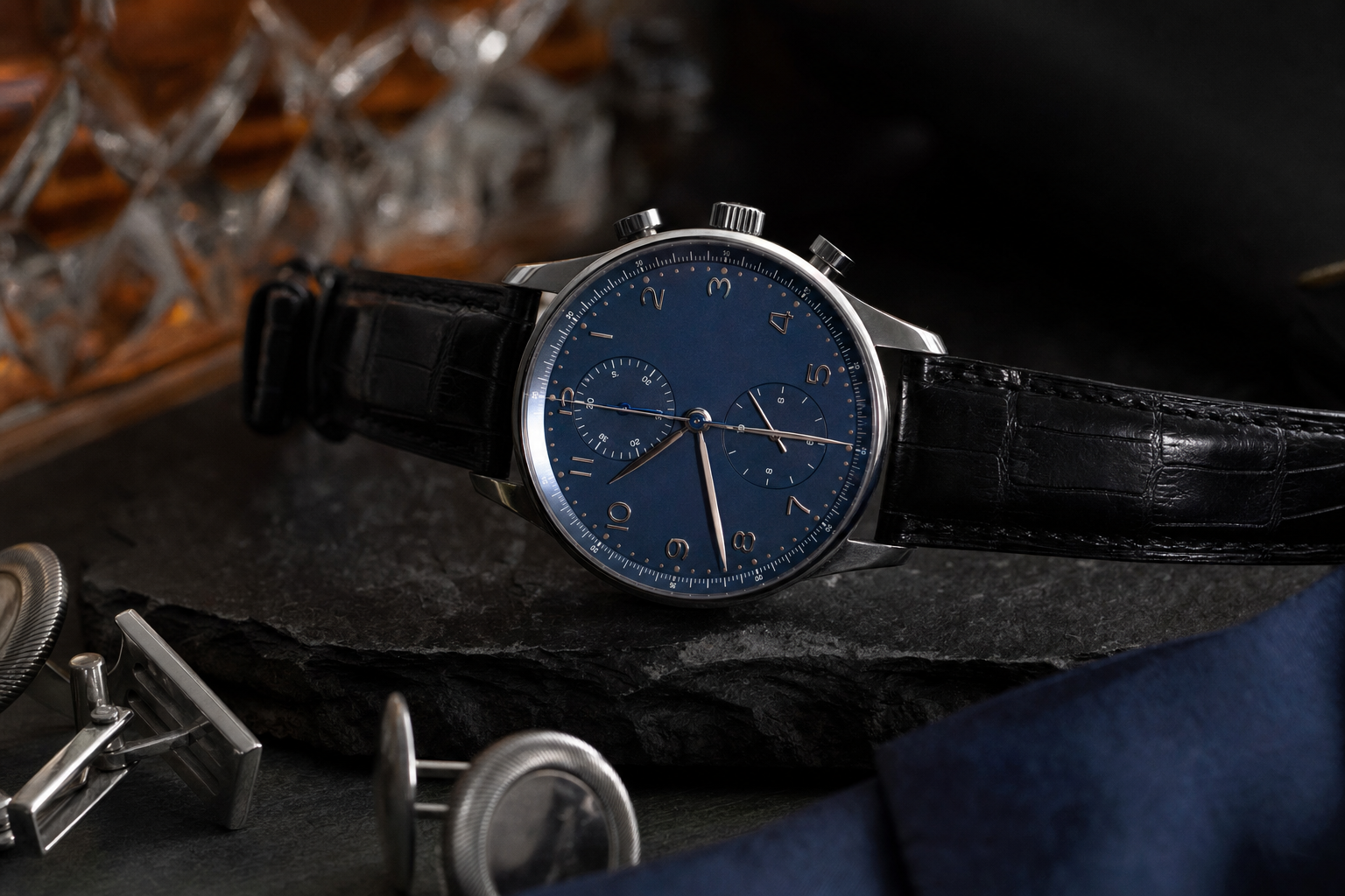 IWC Portugieser Chronograph Ref. 3716 in stainless steel, blue dial, blued hands, two silver sub-dials, on a blue leather strap.