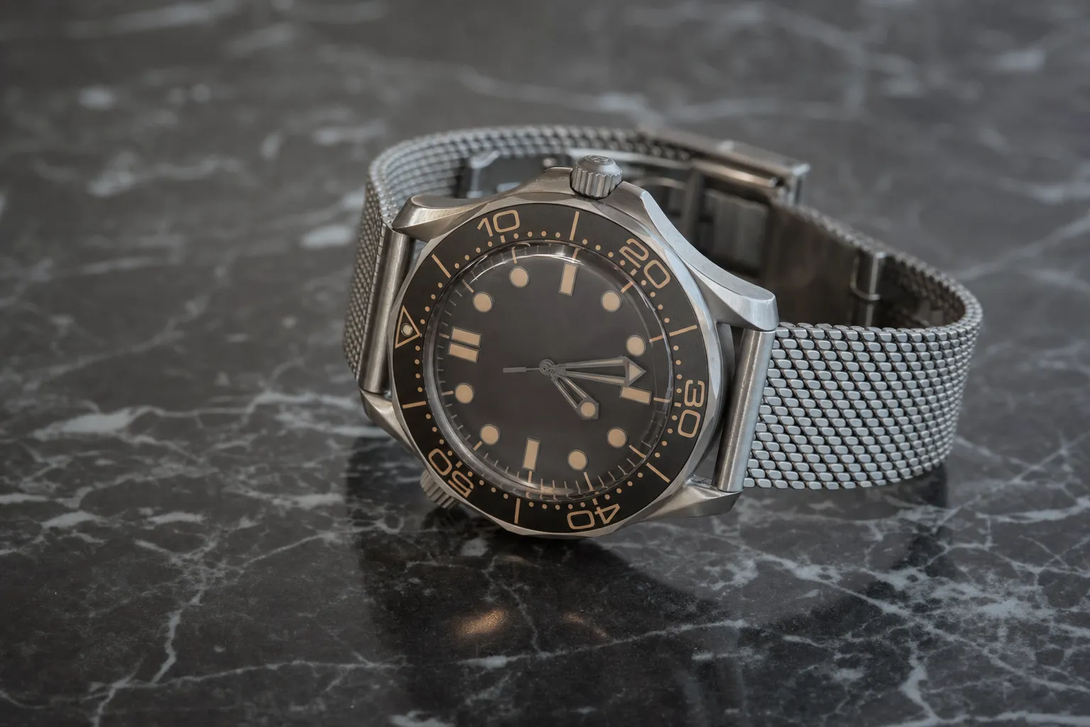 Titanium Omega Seamaster Diver 300M No Time To Die edition watch on mesh bracelet