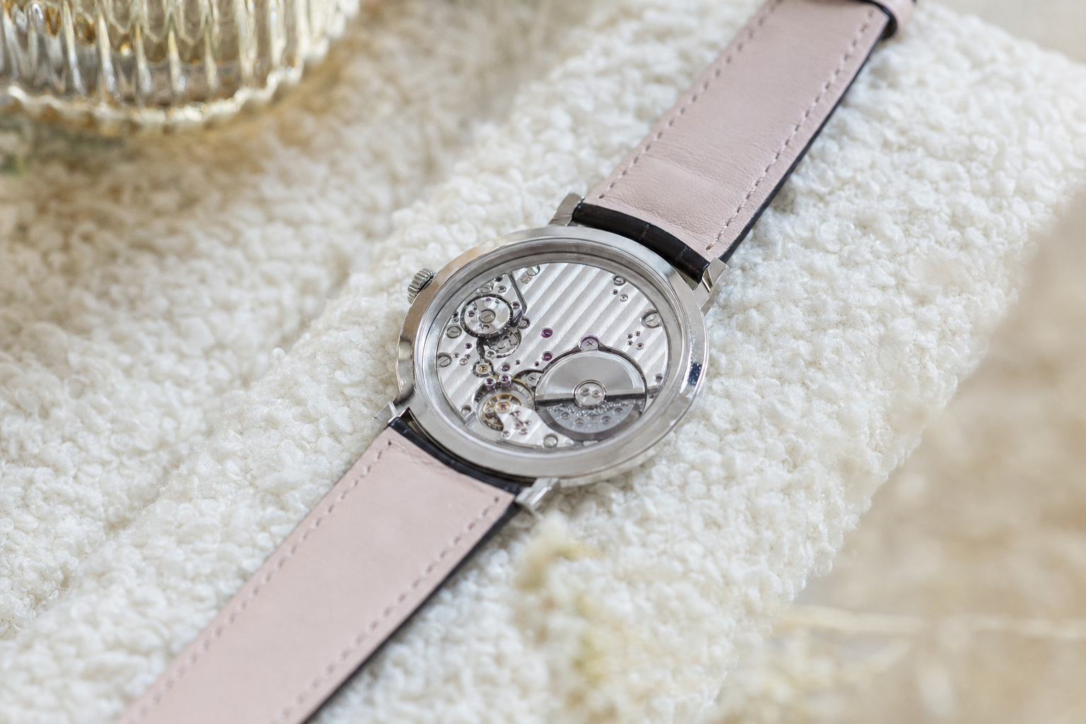 The innovative Piaget Altiplano Ultimate Automatic 910P watch, displaying its revolutionary ultra-thin micro-rotor and integrated mechanical architecture.