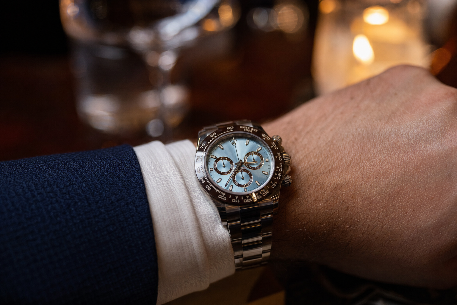 Exquisite platinum Rolex Daytona 126506 with ice-blue dial and brown ceramic bezel, showcased with full documentation.
