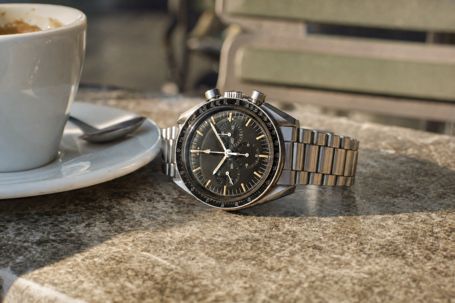 Detailed macro shot of a vintage Omega Speedmaster Professional ST105.012 dial with 'step dial' feature and aged tritium lume on indices and hands, showcasing historical authenticity and character